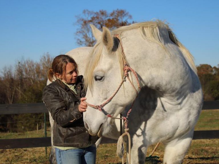 Woman with white horse