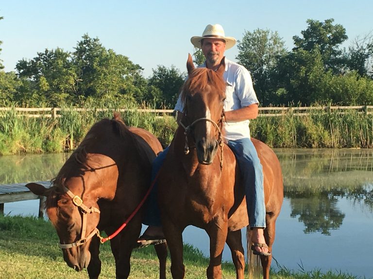 Jim Masterson rides his horse