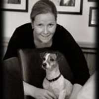 Ruth Hassett, MMCP A woman with a dog.