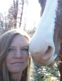 Wendy Shaffer, MMCP A woman with a horse.