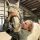 A woman working with a horse.