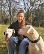 Kalin Finsand, MMCP Equine, NBCAAM, with 2 dogs.