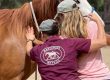 Instructor teaching a student how to do a Masterson Method technique with hands-on assistance.
