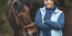 A woman and a horse.
