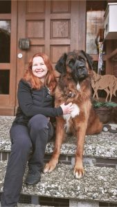 A woman with her dog.