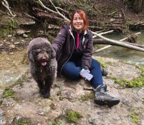 A woman with her dog.