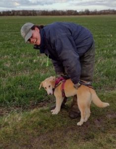 A woman with her dog.