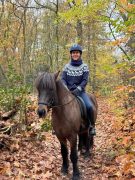 Margriet Kalmann MMCP A woman riding her horse.