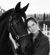 A woman and a horse.